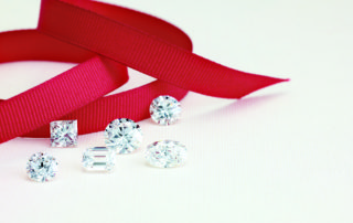 diamonds with a red ribbon